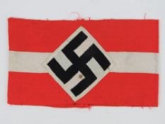 A WWII Hitler Youth three-piece arm band, in frame.