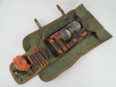 A WWII German CZ ZB26-30 7.92 LMG Gunners kit with tools, oil bottles, brushes, springs, etc.