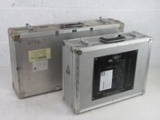 Two ex military flight cases approx. 65 x 35cm and 46 x 34cm.