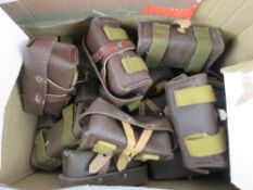 Twenty SKS ammo pouches.