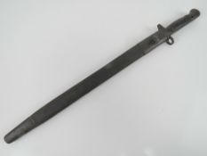 A WWI SMLE 1907 pattern bayonet with scabbard.