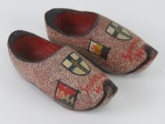 A pair of Dutch made souvenir novelty clogs each dated 1944 upon,