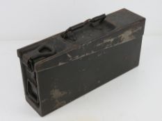 AN MG34 ammo tin having German marks upon.