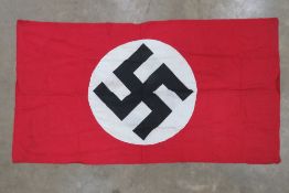 A WWII German flag stamped Alfred Eriksen, 140 x 74cm.