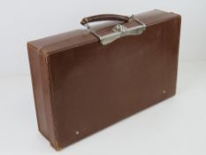 A vintage brown leather 'autosnap' briefcase 46 x 27 x 11cm.