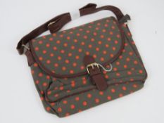A orange polka dot fabric handbag 'as new' 27 x 24cm.