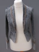 A Christian LaCroix jean jacket size 38.