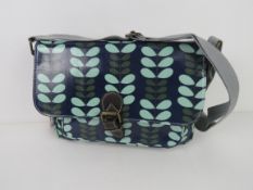 A leaf patterned handbag in blue 'as new', approx 31 x 20cm.