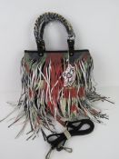 A fringed tote bag 'as new' approx 32 x 35cm.