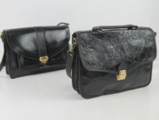 Two vintage black leather handbags each 29 x 22cm.