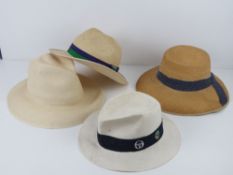 An Olney genuine panama hat size 71/8, together with a Wimbledon straw hat size large,