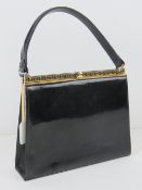 A vintage Jane Shilton black patent leather handbag 22 x 19cm.