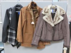 A ladies jacket with faux fur lining, size L. Together with two other ladies jackets. Three items.