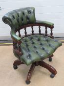 A good contemporary green leather button back reclining swivel office chair, studded throughout.