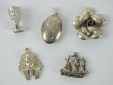 A Sterling silver locket together with a white metal ship pendant,