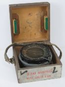 A WWII military issue gimble type P4A compass within original box bearing various examination