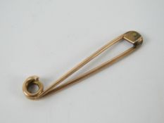 A 9ct rose gold bar brooch, stamped 9c, 1.7g.