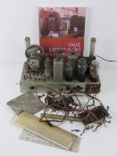 A valve radio and audio repair handbook, together with a scratch built lighting board.