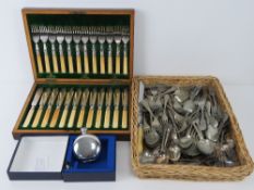 A cased set of fish knives and forks for twelve settings,