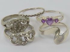 Five silver rings sizes O-P, each stamped 925.