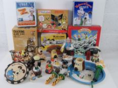 An extensive collection of Wallace & Gromit collectibles inc alarm clock, soap dish,