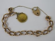 A vintage 9ct rose gold charm bracelet with heart padlock clasp, hallmarks to links,