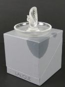 Lalique; a frosted and clear glass ring tray having central squirrel,