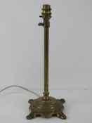A brass table lamp base, adjustable height, tallest 57cm, shortest 38cm.