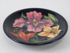 A Moorcroft Tigris Lilies MCC 2003 pin tray, 12cm dia.