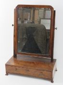 A mid-Georgian walnut and mahogany toilet mirror, single frieze drawer raised over corner feet,