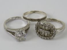 Three silver rings sizes L-M, each stamped 925.