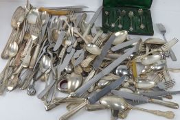A quantity of assorted silver plated and other cutlery inc wine collar, serving spoons,