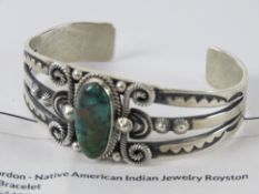 A Derrick Gordon Native American (Navajo) sterling silver bracelet set with Royston turquoise, 2.