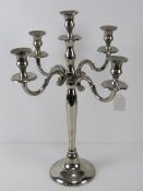 A large contemporary chrome candelabra standing 55cm high.