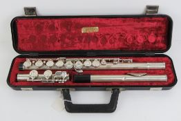 Flute: a silver plated Evette flute musical instrument, marked and case, no.