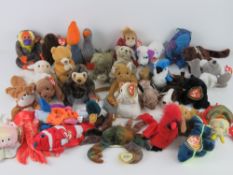 A large quantity of Ty Beanie Babies all with tags; 'Bananas', 'Runner', 'Scurry', 'Mac', 'Pecan',