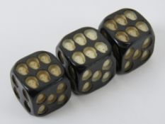 Masonic; three dice having inset skulls replacing the dots.