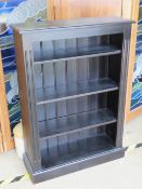 An ebonised three shelf bookcase, 78 x 110cm.