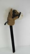 Musical Hobby Horse; a fine Chestnut Hunter with white mane, cloth bridle, measuring two hands,
