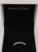 A Pandora ring, size 52, stamped S925 ALE. In box.