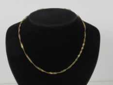 A 9ct gold fancy twist flattened curb link chain necklace, hallmarked 375, 45cm in length, 4.3g.