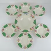 A Hoult & Co Sandringham pattern large dessert bowl with six matching small bowls all in a floral