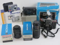 A Practika ML5 35mm SLR camera in box, together with a Practika 8-200mm zoom lens,