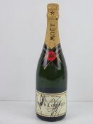 A hand signed bottle of Moet & Chandon Brut Imperial champagne.
