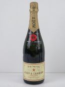 A hand signed bottle of Moet & Chandon Brut Imperial champagne.