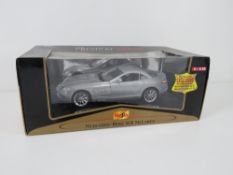 A Maisto 1:18 scale Mercades-Benz SLR McLaren, box a/f.