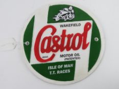 A cast wall sign marked 'Castrol Isle of Man TT Races' painted in red,
