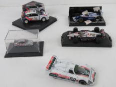 A quantity of model cars including 1:43 scale Ford Focus WRC (Colin McRae) 416 of 5000,
