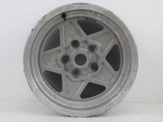 A single wheel for a Ferrari Dino 308.