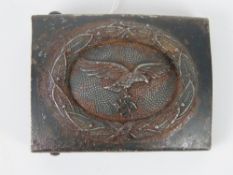 A WWII German Luftwaffe belt buckle having A&S makers mark.